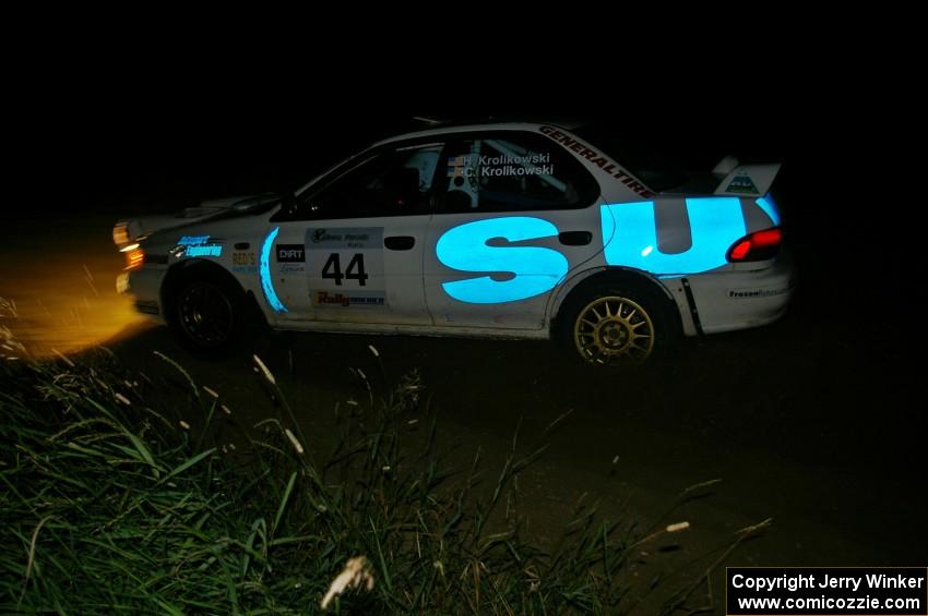 Henry Krolikowski / Cindy Krolikowski driving hard through a left-hander on SS6 in their Subaru Impreza.