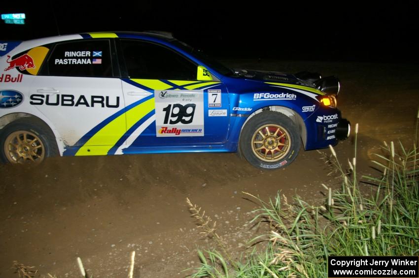 Travis Pastrana / Derek Ringer hard on the brakes at a hairpin on SS8 in their Subaru WRX STi.