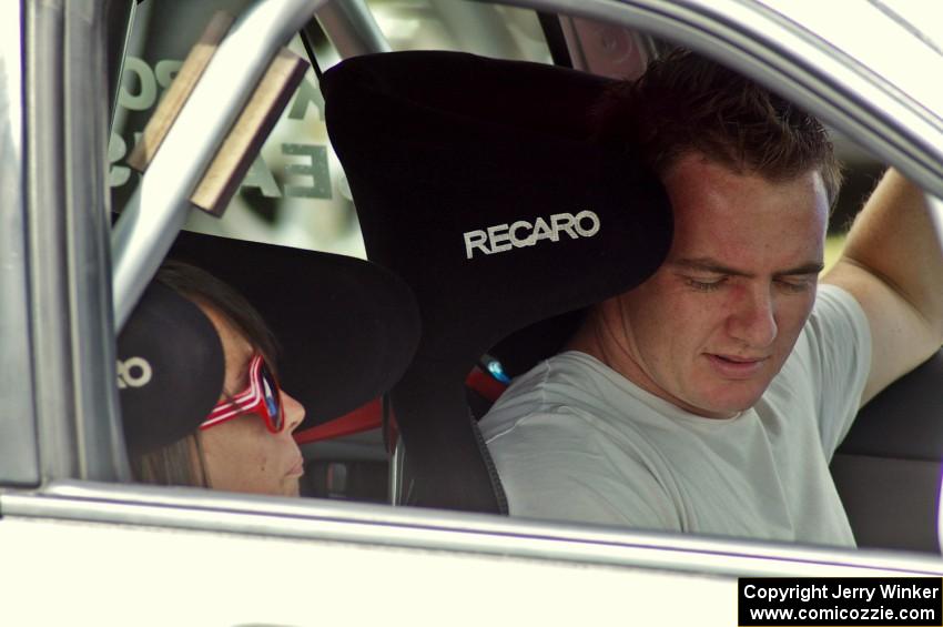 Piotr Wiktorczyk / Chrissie Beavis prepare to leave parc expose in their Subaru WRX STi.