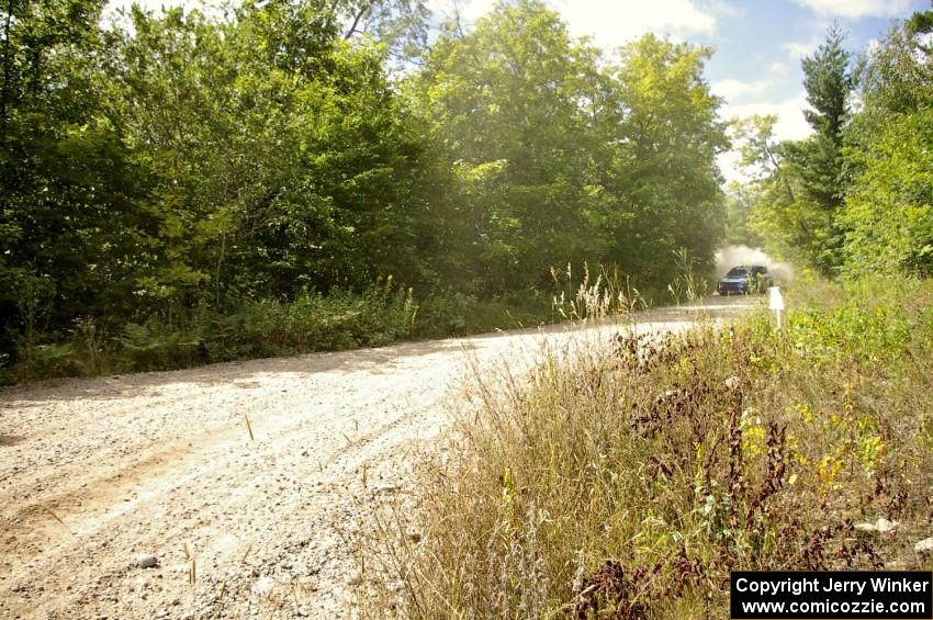 Travis Pastrana / Derek Ringer at speed on SS10 in their Subaru WRX STi.