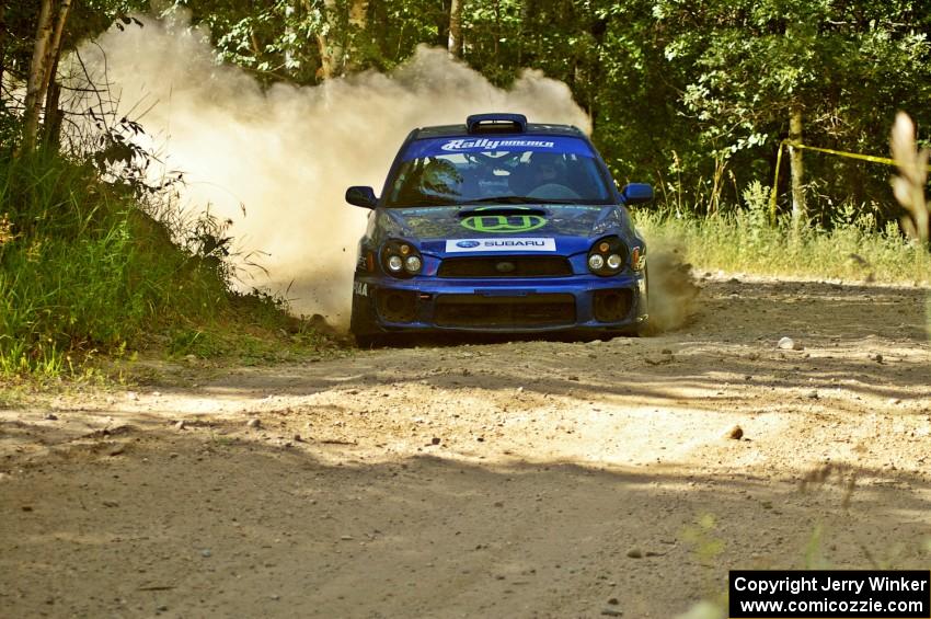 Heath Nunnemacher / Kim DeMotte nail a right-hander on SS12 in their Subaru WRX.