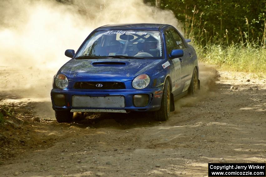 The George Georgakopoulos / Faruq Mays Subaru WRX through a 90 degree right-hander on SS12.