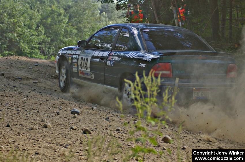 Chris Greenhouse / Don DeRose through an uphill right-hander on SS12 in their Plymouth Neon.