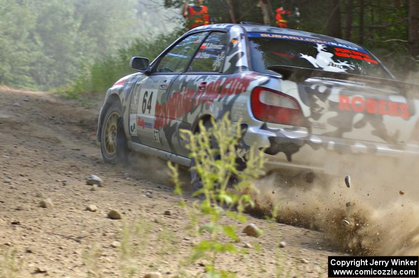 Robert Borowicz / Dave Parps accelerate through an uphill right-hander on SS12 in their Subaru WRX.