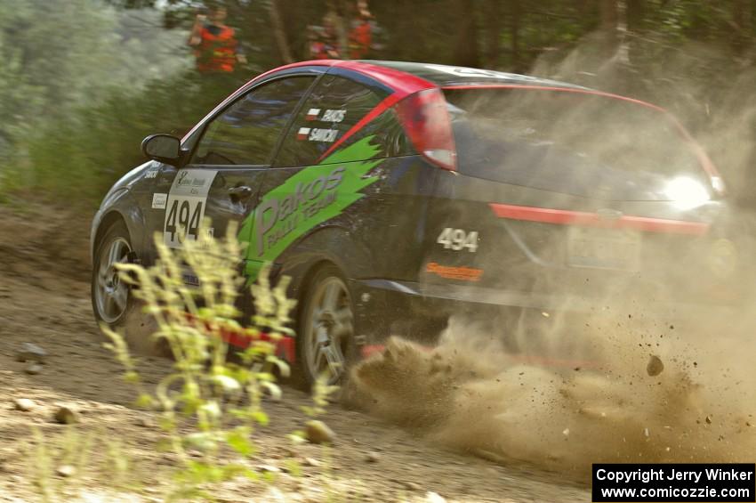 Roman Pakos / Maciej Sawicki through an uphill right on SS12 in their Ford Focus SVT.