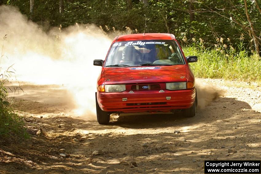 Gerardo Pin / John Butler through a 90-right on SS12 in their Ford Escort GT.