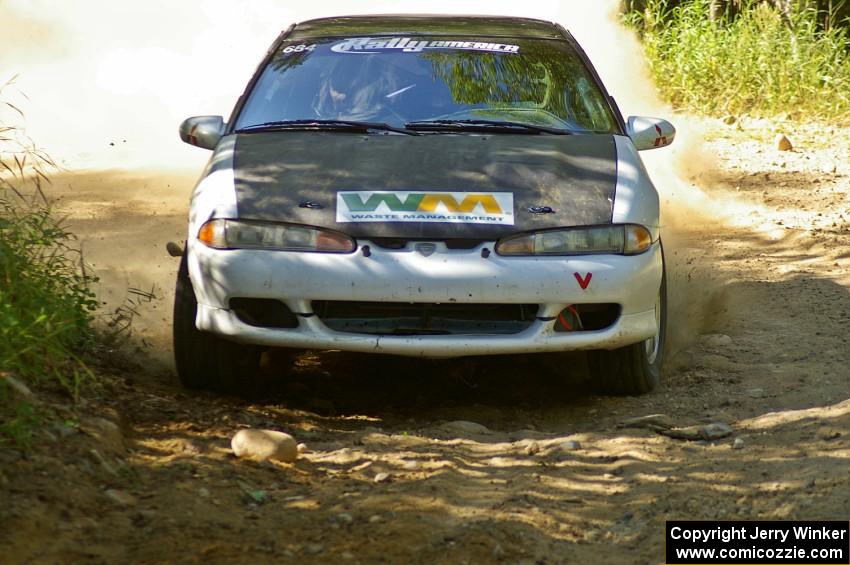 Adam Markut / Chris Gordon at an uphill 90-right on SS12 in their Eagle Talon.