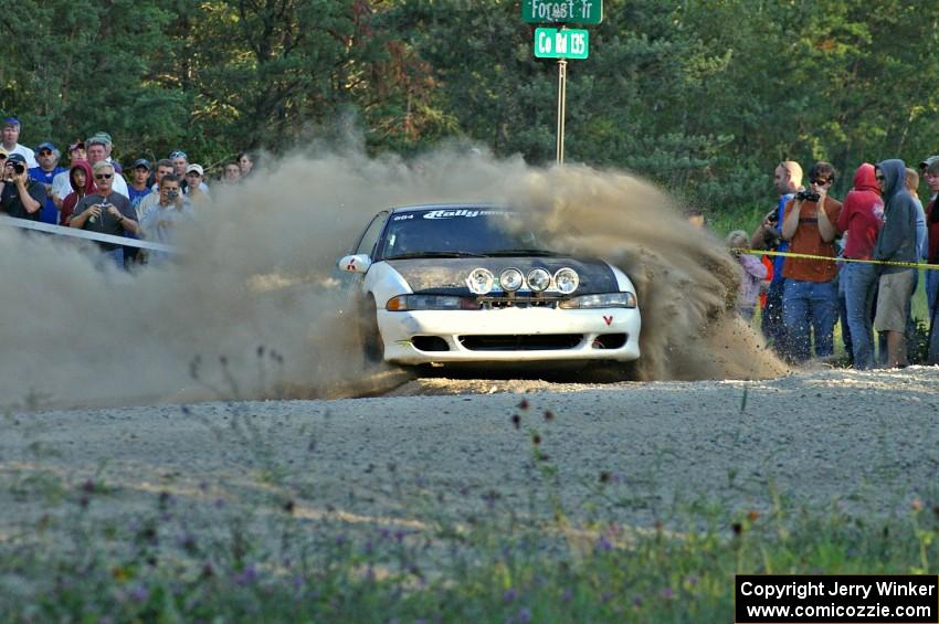 Adam Markut / Chris Gordon throw a blanket of gravel over their Eagle Talon at the SS13 spectator point.