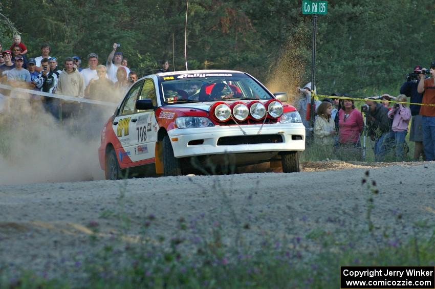 Jan Zedril / Jody Zedril come onto the county road on SS13 in their Mitsubishi Lancer ES.