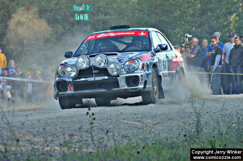 Robert Borowicz / Dave Parps blast away from the spectator location on SS13 in their Subaru WRX.