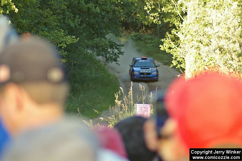 The Subaru WRX STi of Slowomir Balda / Janusz Topor comes into the spectator location on SS13.