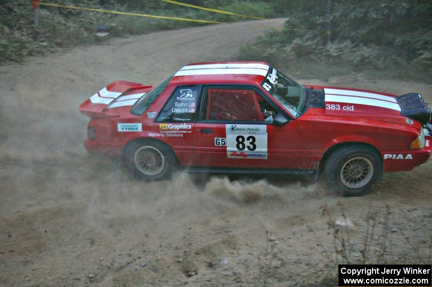 Mark Utecht / Rob Bohn drift through a right-hander on SS15 in their Ford Mustang.