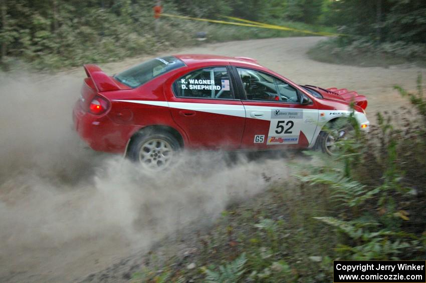 Doug Shepherd / Karen Wagner perfectly apex a right-hander on SS15 in their Dodge SRT-4.