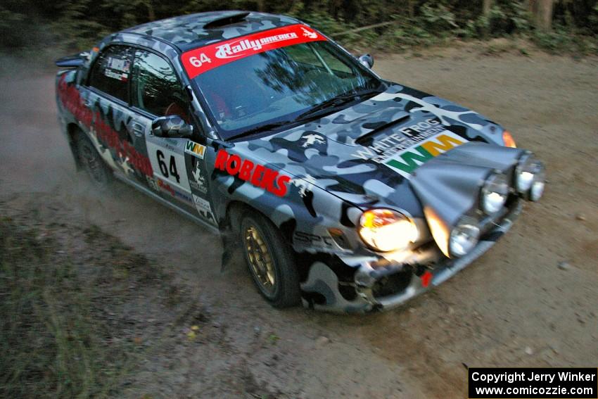 Robert Borowicz / Dave Parps prepare for a right-hander on SS15 in their Subaru WRX.