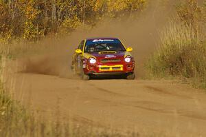 The Bryan Pepp / Jerry Stang Subaru WRX drifts through a fast sweeper on the practice stage.