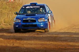 Slawomir Balda / Janusz Topor set their Subaru WRX for a 90-left on the practice stage.