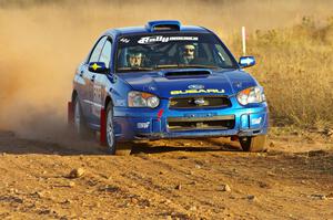 Slawomir Balda / Janusz Topor at speed in their Subaru WRX on the practice stage.