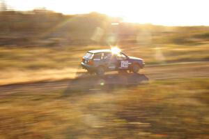 Paul Koll / Carl Seidel at speed on a straight on the practice stage in their VW Golf.