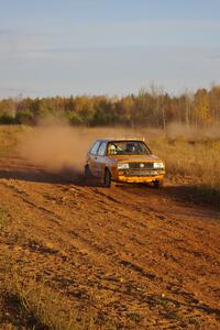 Chad Eixenberger / Jay Luikart at speed at the exit of a fast sweeper on the practice stage in their VW Golf.