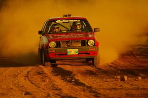 Daryn Chernick / Heidi Nunnemacher at speed out of a fast sweeper on the practice stage in their VW GTI.