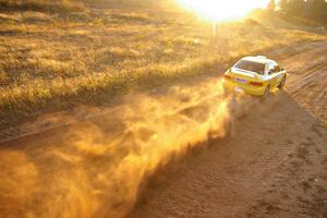 Kyle Sarasin / Mikael Johansson at speed down a straight on the practice stage in their Subaru Impreza.