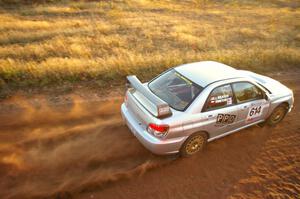 Piotr Wiktorczyk / Alan Dolan at speed on the practice stage in their Subaru WRX STi.