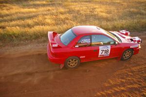 Dustin Kasten / Dave Parps at speed on the practice stage in their Subaru Impreza.