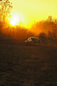 Heath Nunnemacher / Travis Hanson drive their Subaru WRX into the sunset on the practice stage.