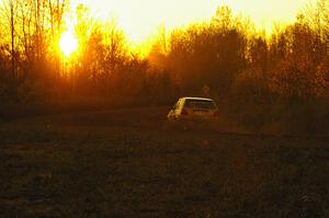 The Chad Eixenberger / Jay Luikart VW Golf heads off into the sunset on the practice stage.