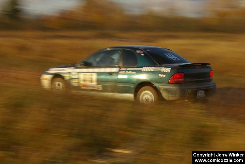 Chris Greenhouse / Don DeRose at speed down a straight on the practice stage in their Plymouth Neon.