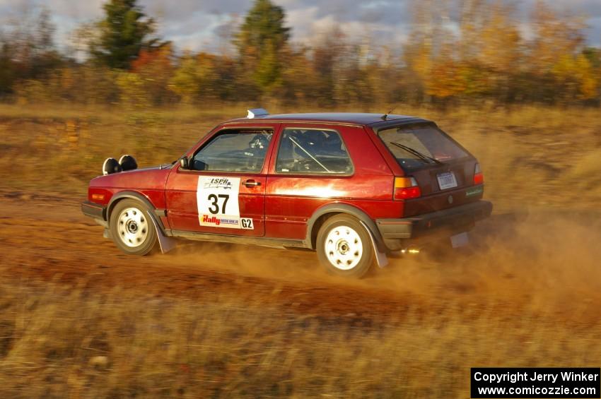 Billy Mann / Josh VanDenHeuvel at speed in their VW GTI on the practice stage.