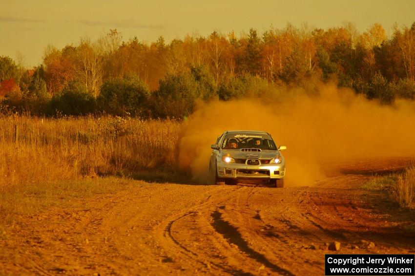 The Piotr Wiktorczyk / Alan Dolan Subaru WRX STi on the practice stage.