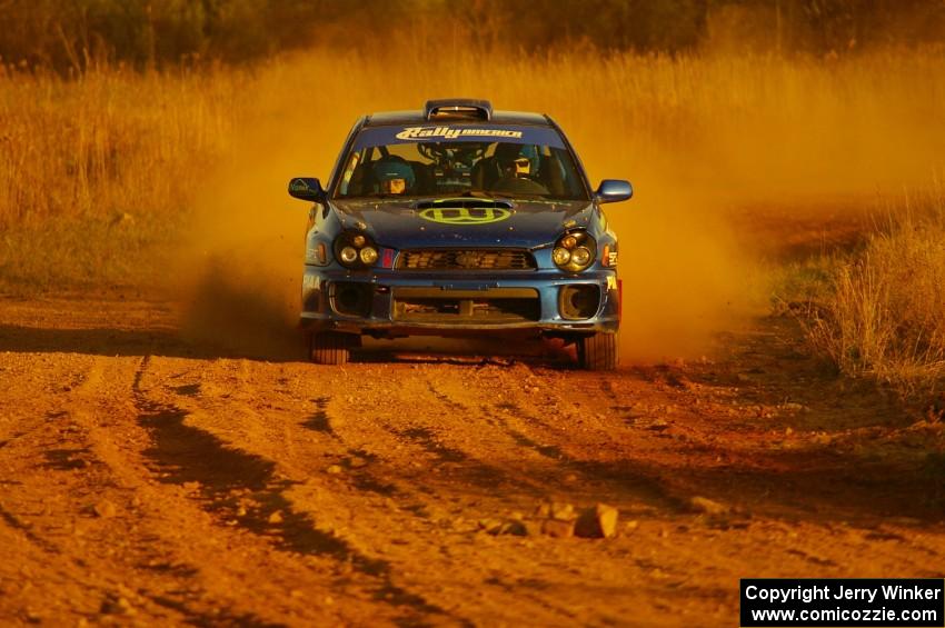 Heath Nunnemacher / Travis Hanson drift their Subaru WRX out of a fast sweeper on the practice stage.