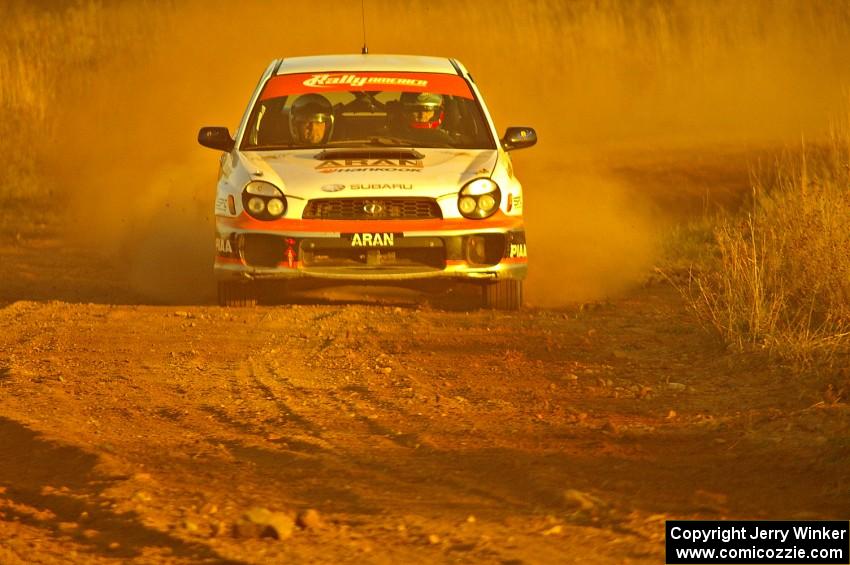 The Pat Moro / Mike Rossey Subaru WRX drifts out of a fst sweeper on the practice stage.