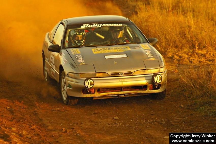 Spencer Prusi / Mike Amicangelo accelerate out of a sweeper in their Eagle Talon on the practice stage.