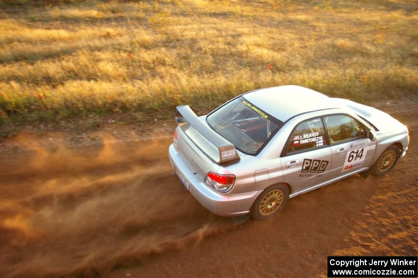 Piotr Wiktorczyk / Alan Dolan at speed on the practice stage in their Subaru WRX STi.