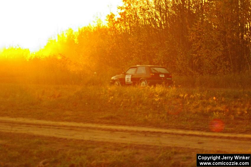 Billy Mann / Josh VanDenHeuvel drive their VW GTI off into the sunset near the end of the practice stage.