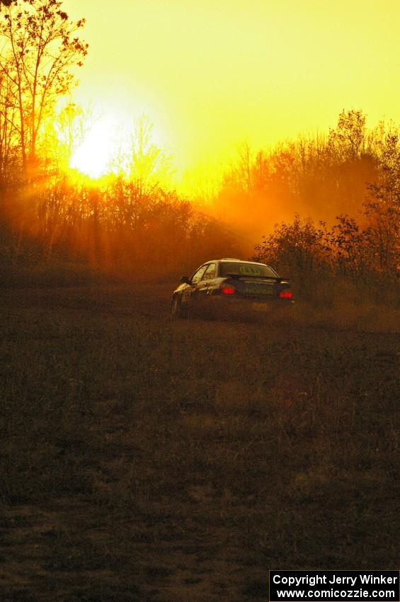 Heath Nunnemacher / Travis Hanson drive their Subaru WRX into the sunset on the practice stage.