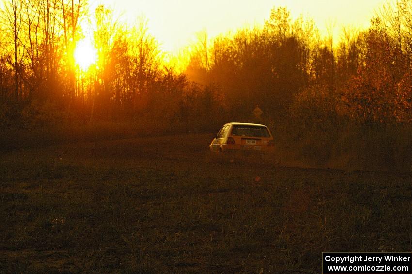 The Chad Eixenberger / Jay Luikart VW Golf heads off into the sunset on the practice stage.