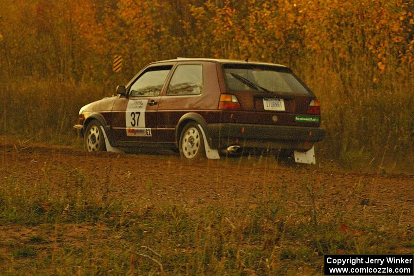 Billy Mann / Josh VanDenHeuvel accelerate down a straight on the practice stage in their VW GTI.