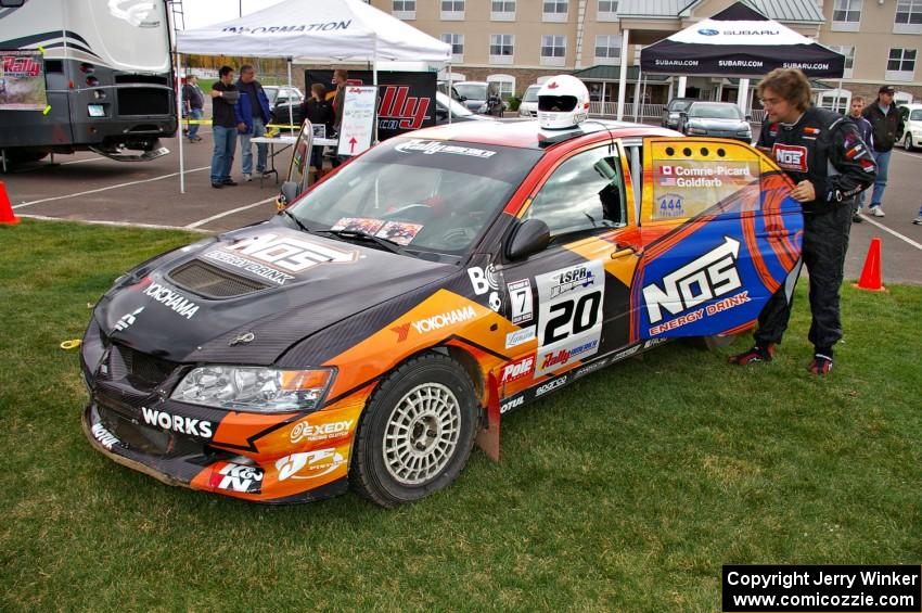 Andrew Comrie-Picard Mitsubishi prepares to climb into his Lancer Evo 9 RS that he shared with Marc Goldfarb at parc expose.