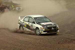 Andi Mancin / Maciej Wislawski set up their Mitsubishi Evo 9 for a hard left at the spectator point on SS1.