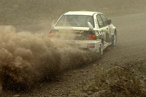 Andi Mancin / Maciej Wislawski power their Mitsubishi Evo 9 out of a 90-left on SS1.