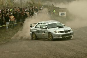 Piotr Wiktorczyk / Alan Dolan at the SS1 spectator location in their Subaru WRX STi.