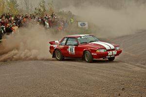 Mark Utecht / Rob Bohn set up their Ford Mustang for a hard left at the spectator location on SS1.