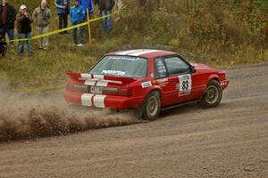 Mark Utecht / Rob Bohn power away from the spectator location on SS1 in their Ford Mustang.