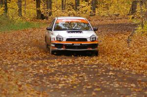The Pat Moro / Mike Rossey Subaru WRX drifts through a sweeper near the finish of SS2, Beacon Hill.