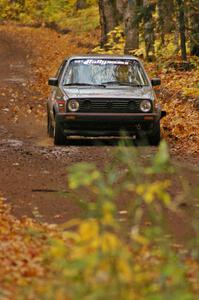 Dave Cizmas / Matt Himes down a fast slick straight on SS2, Beacon Hill, in their VW GTI.