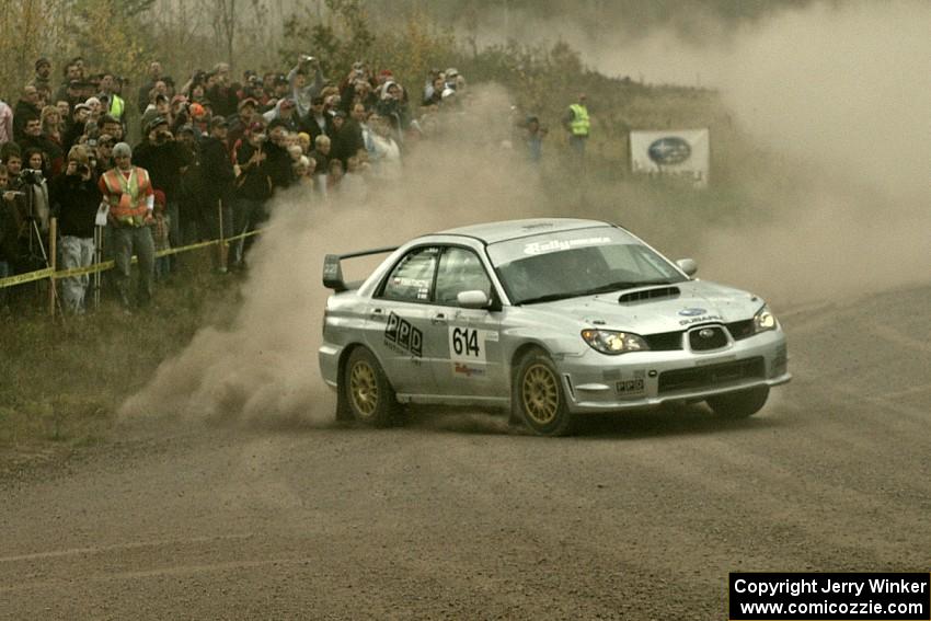 Piotr Wiktorczyk / Alan Dolan at the SS1 spectator location in their Subaru WRX STi.