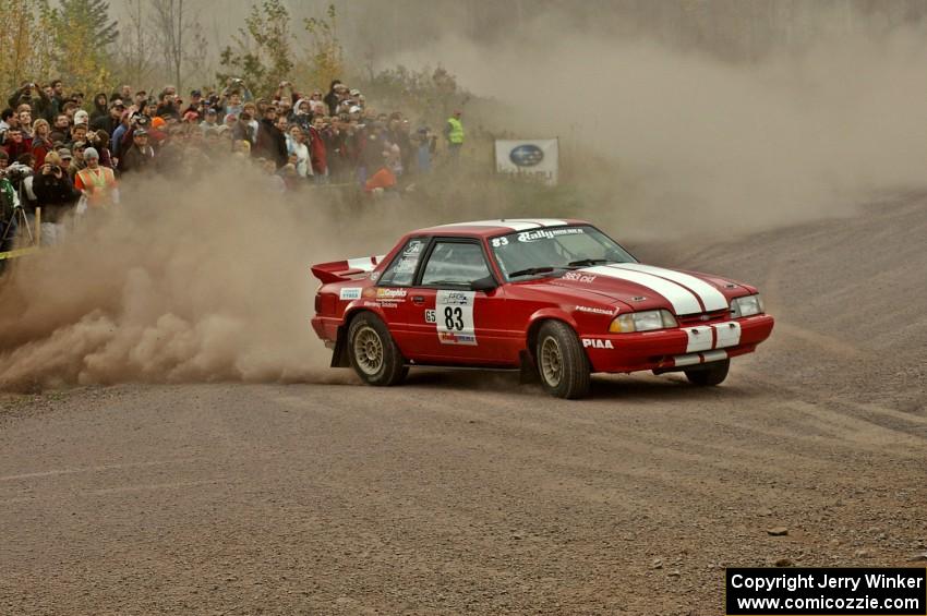 Mark Utecht / Rob Bohn set up their Ford Mustang for a hard left at the spectator location on SS1.